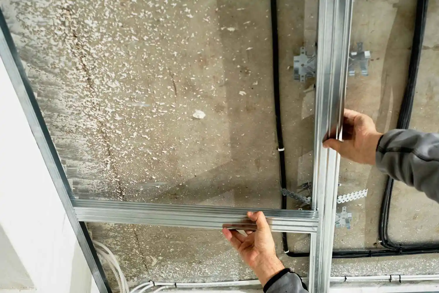 Florida Soundproofing consultant inspecting wall assembly